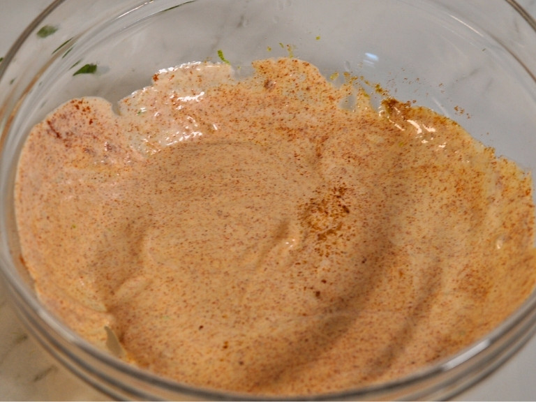 elotes pasta salad dressing mix in glass bowl