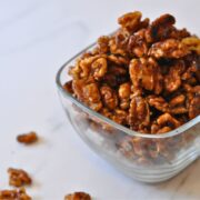 glass bowl of glazed "candied" walnuts